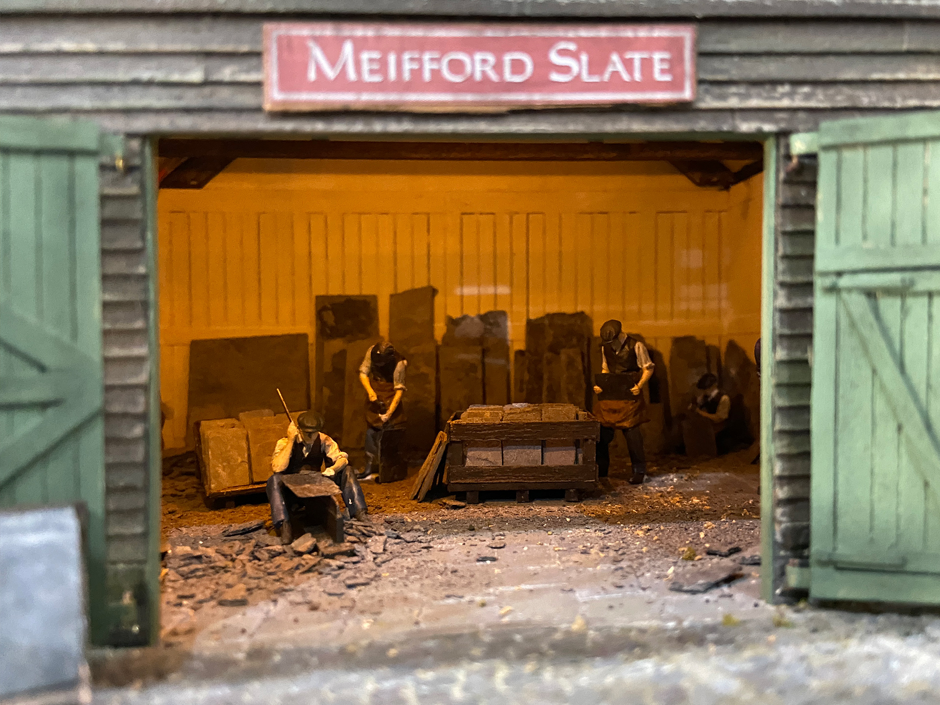 Slate workers busy cutting slates
